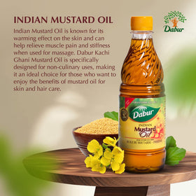 Dabur Kachi Ghani Mustard Oil being poured, ideal for massage.