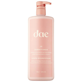 DAE Signature Conditioner bottle front shows versatile hydration for all hair types