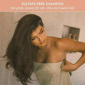 DAE Signature Shampoo in a bathroom scene conveys hydration and spa-like routine.