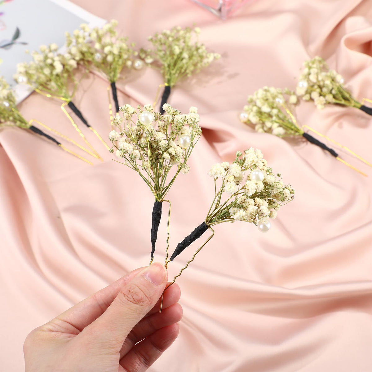 Daifunli dried gypsophila hair pin in white, lightweight wear.