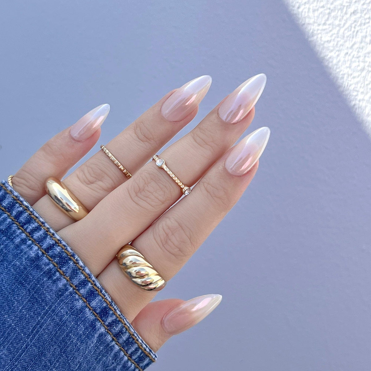 Clear base gel applied to nails to prep chrome powder application.