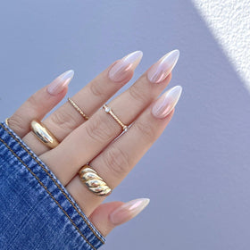 Clear base gel applied to nails to prep chrome powder application.