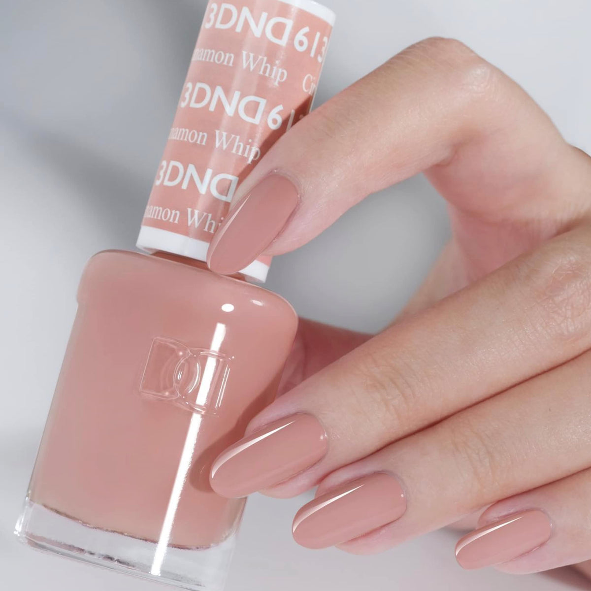 DAISY DND Cinnamon Whip Lacquer swatch illustrating color coordination with gel polish
