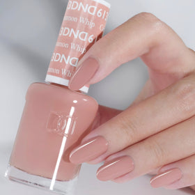 DAISY DND Cinnamon Whip Lacquer swatch illustrating color coordination with gel polish