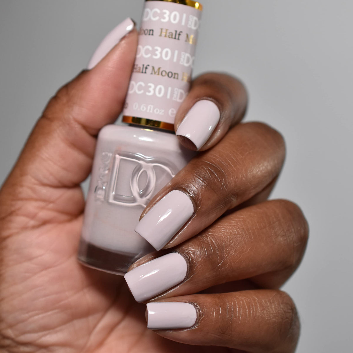 DAISY DND DC gel polish Grey Collection bottle showing even coverage.