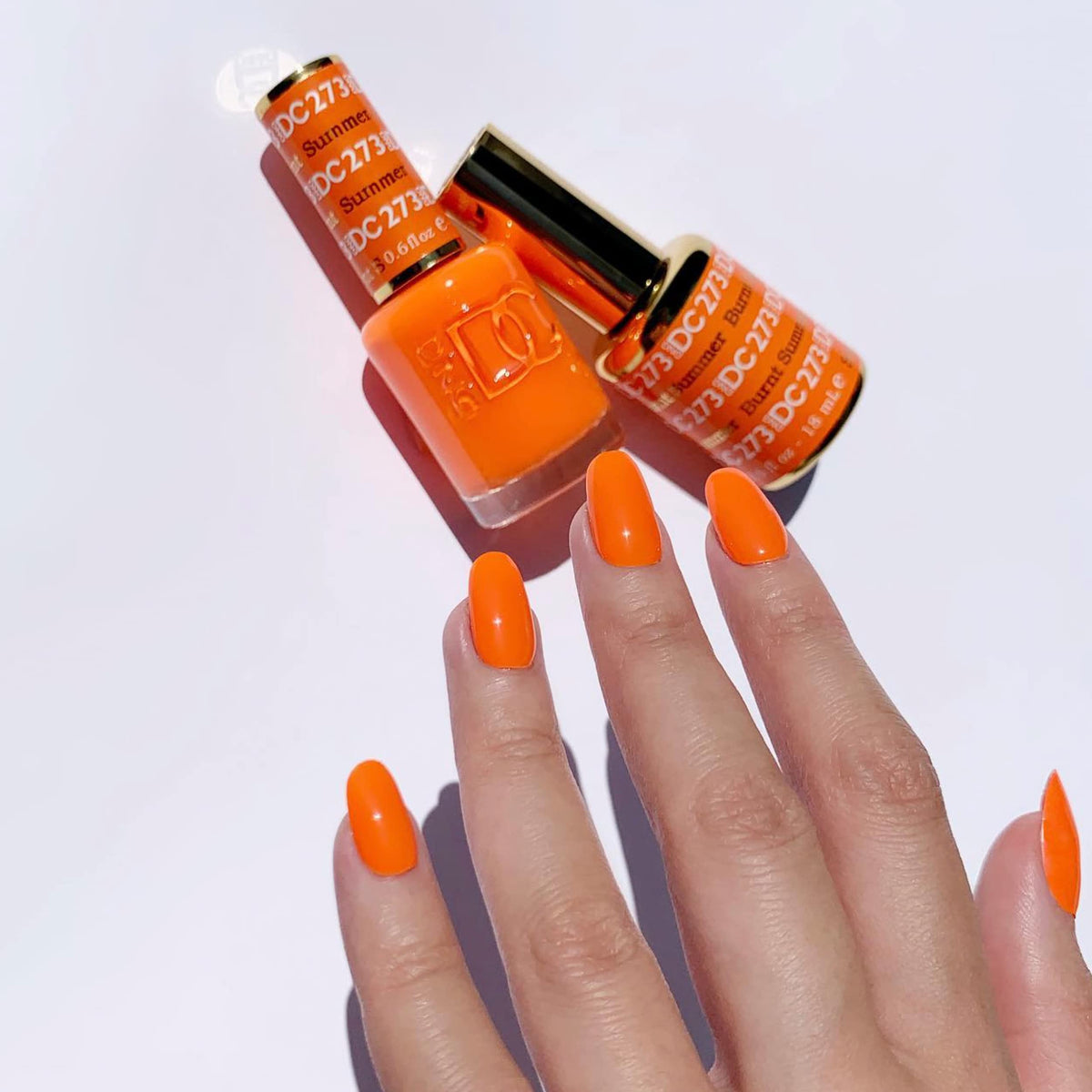 DAISY DND DC orange gel polish swatches display rich color payoff