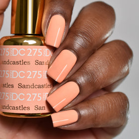 DAISY DND orange lacquer swatch, quick-dry gloss for at-home nails.