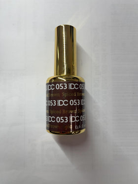 Daisy DND Walnut Brown nails showcase glossy, chip-free look.