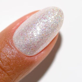 Daisy DND Disco Daydream gel swatch on nail for glitter inspiration.
