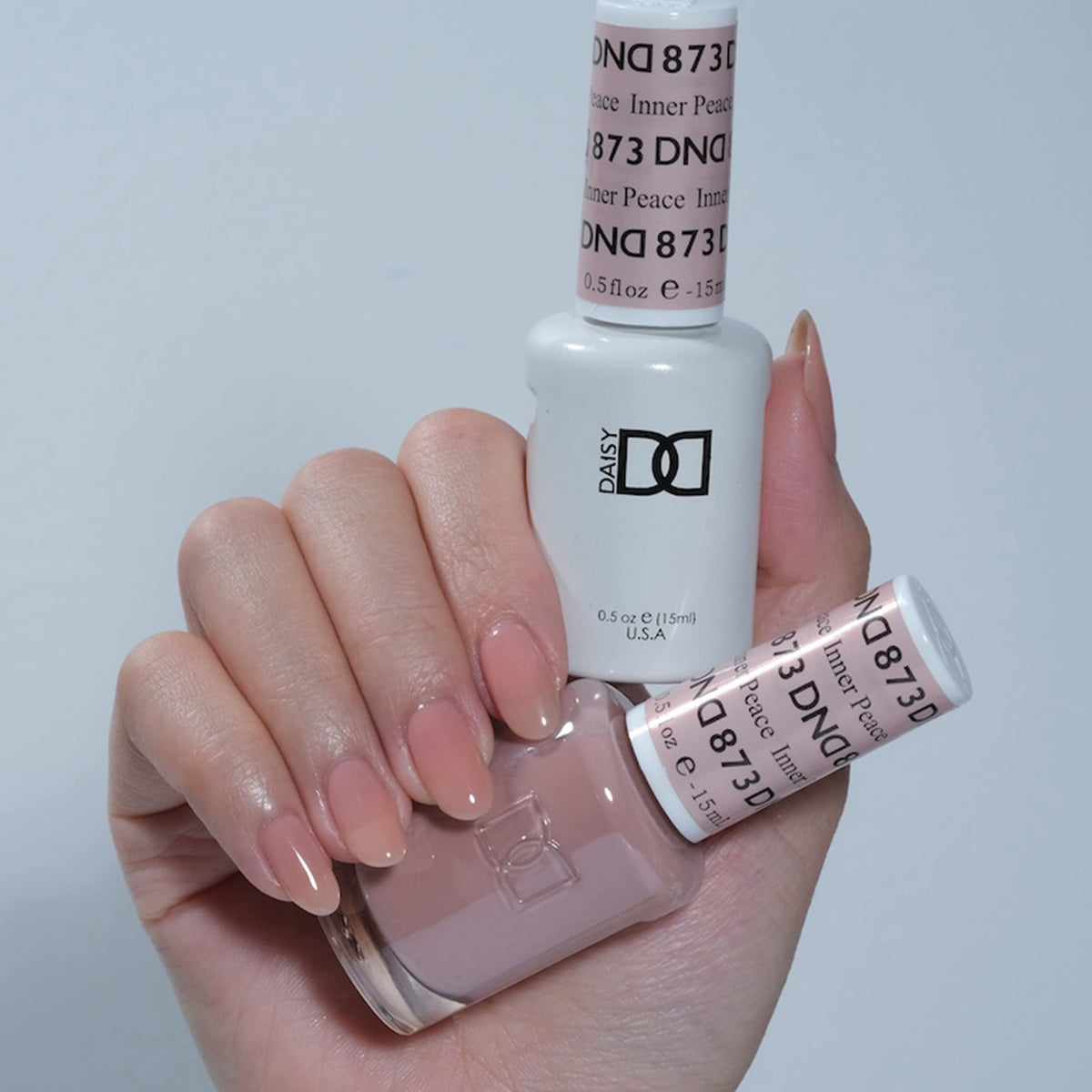 Daisy DND Inner Peace 873 lacquer swatch pairs with the gel polish for a cohesive manicure look.