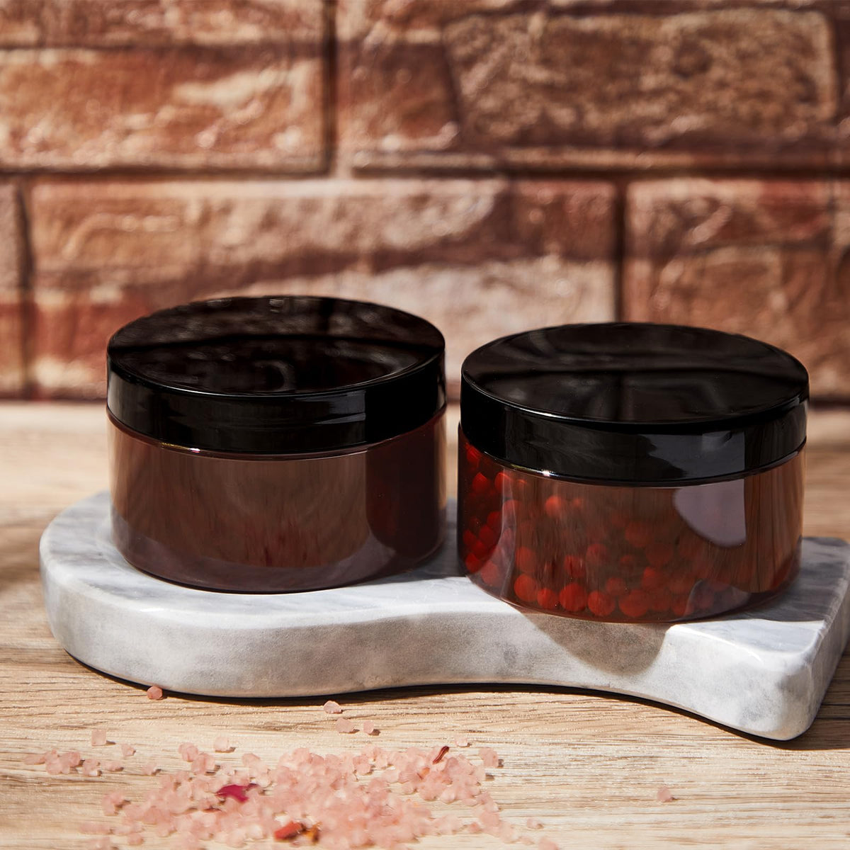 Dandat makeup and lotion sample jars for compact travel.