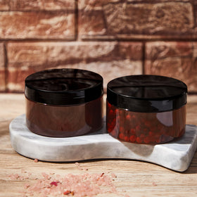 Dandat makeup and lotion sample jars for compact travel.