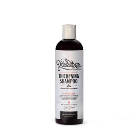 DandyMen Thickening Shampoo bottle pouring to promote root volume.