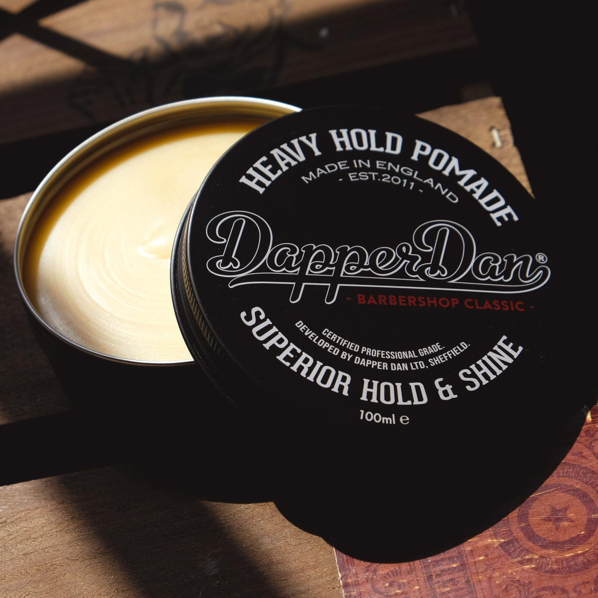 Dapper Dan Heavy Hold Pomade cap twist demonstrates strength and easy cleanup