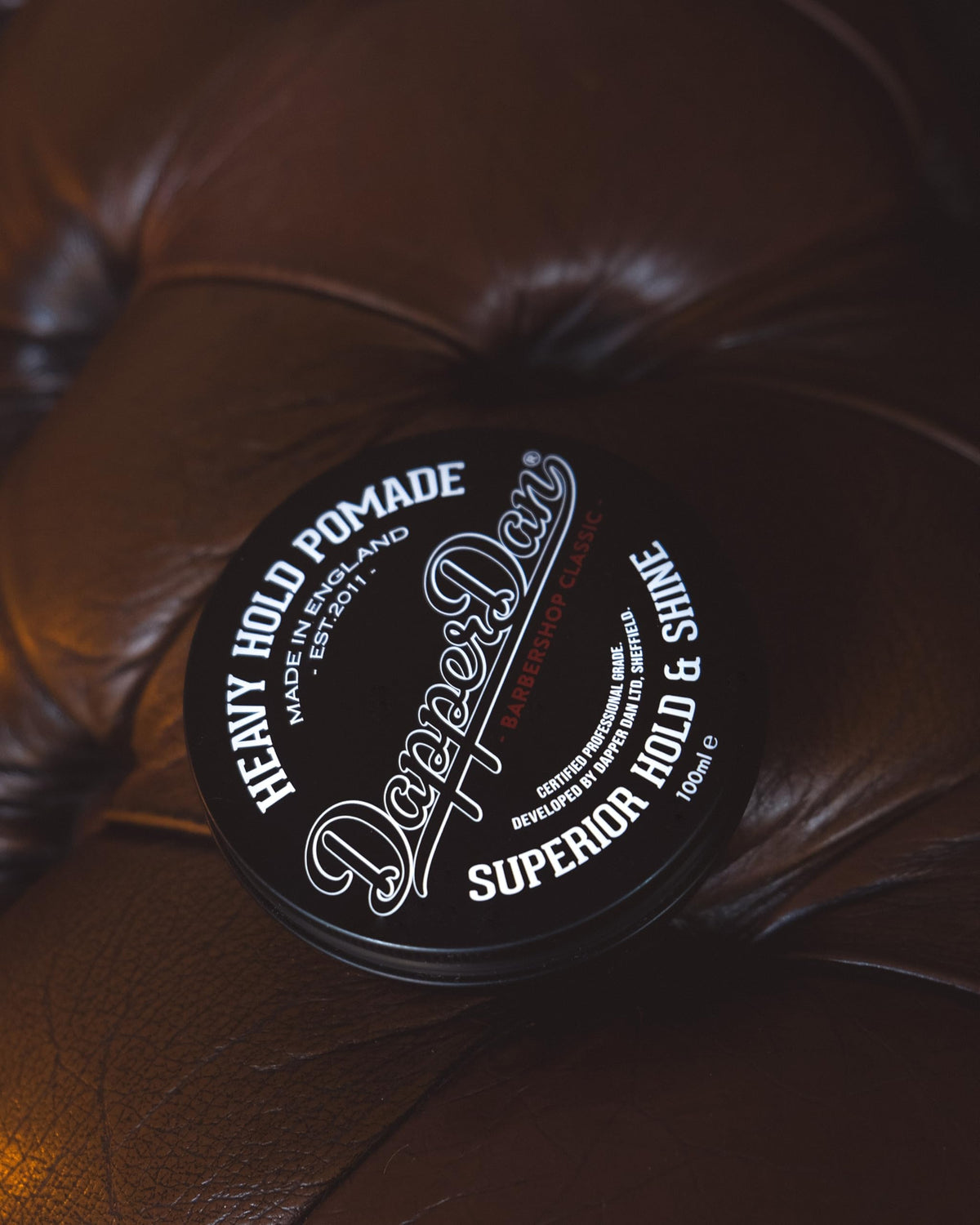 Dapper Dan Heavy Hold Pomade tub label reveals Liquorice and Vanilla fragrance