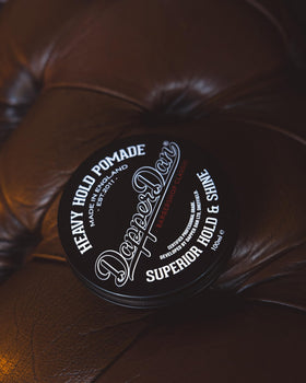 Dapper Dan Heavy Hold Pomade tub label reveals Liquorice and Vanilla fragrance