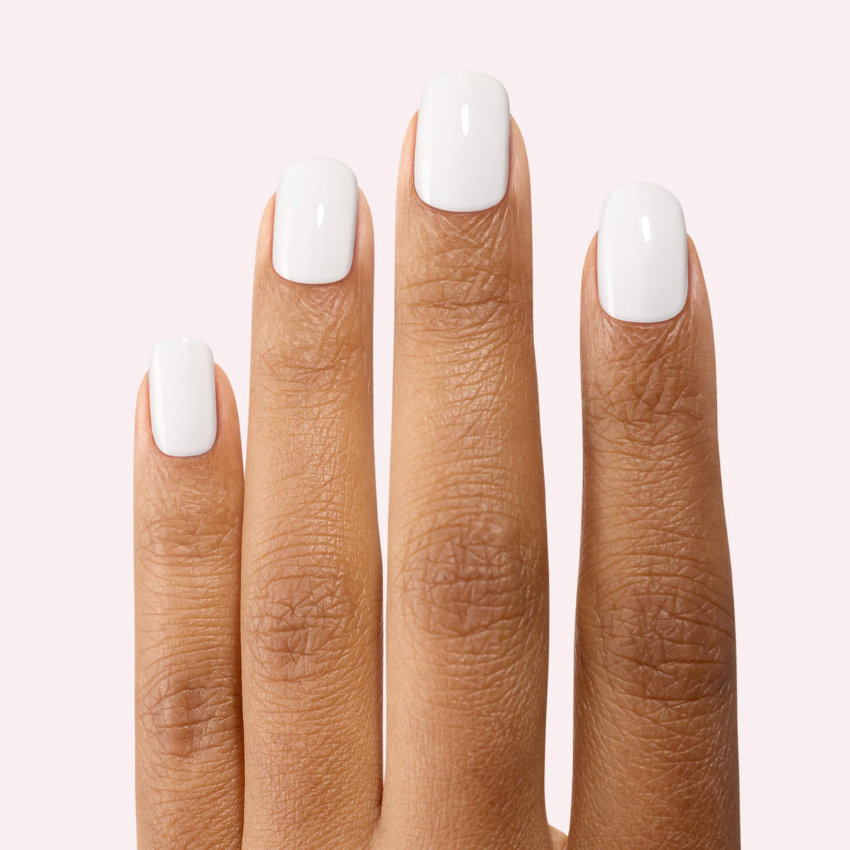Dashing Diva Gloss Real Black and Daikon shade nails for a striking look.