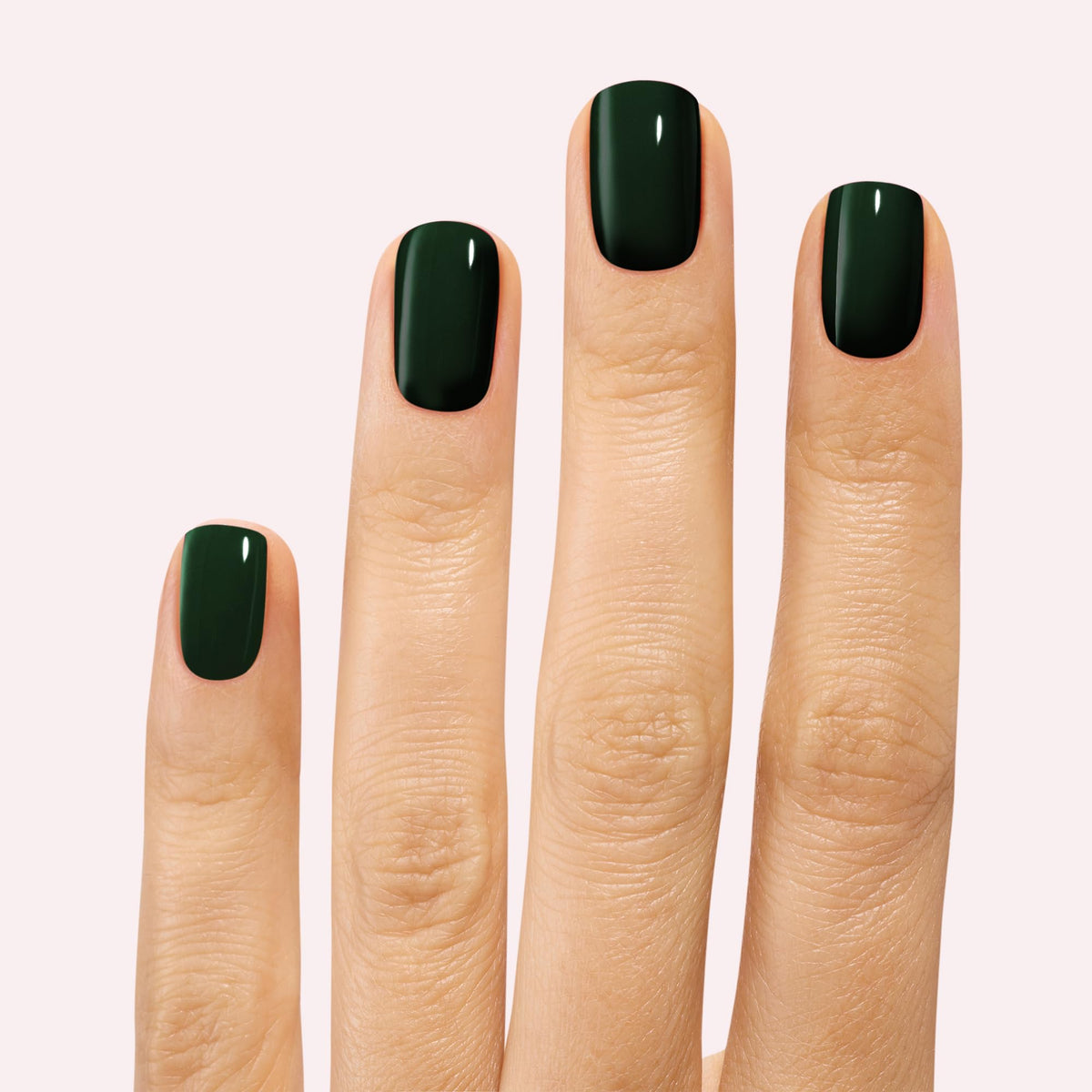 Moody neutrals palette shown on nails for versatile everyday wear.