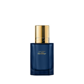 Davidoff Cool Elixir bottle closeup with premium woody fragrance.