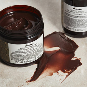Davines Alchemic Chocolate conditioner in shower routine for convenient color refresh.