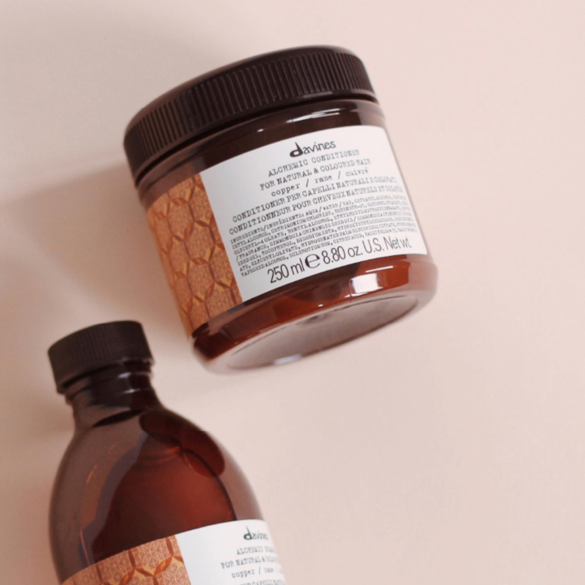 Davines Alchemic Copper conditioner applied to damp hair shows 5-8 minute processing