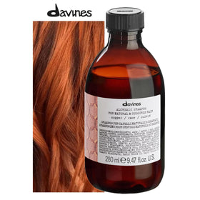 Davines Alchemic Shampoo Copper close-up lather emphasizing cooling red-copper hues.
