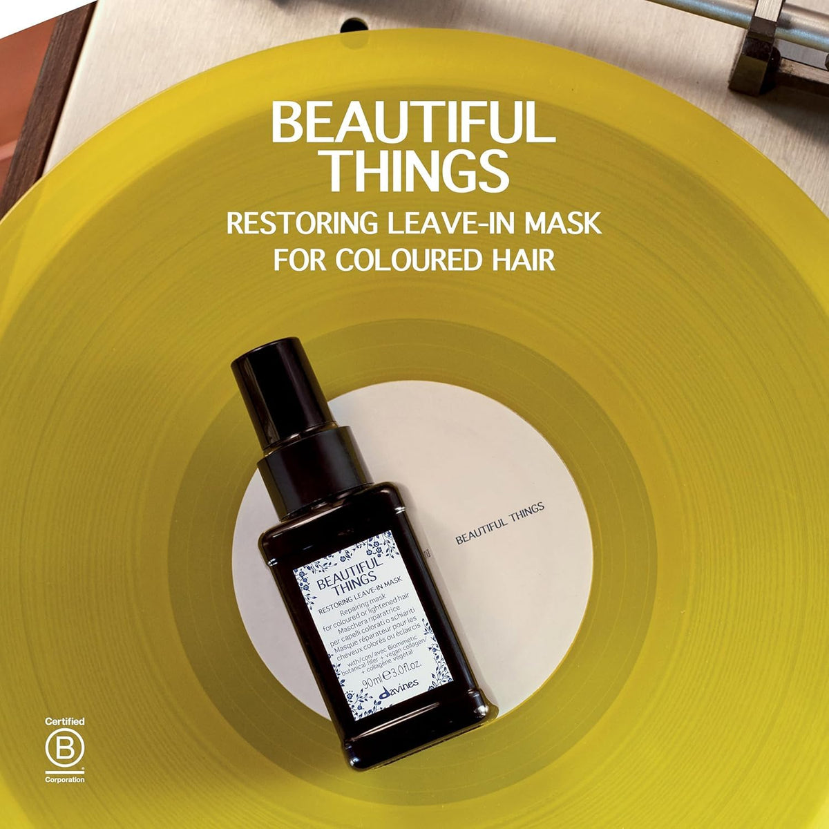 Hands applying Davines Beautiful Things Hair Mask for repair and shine