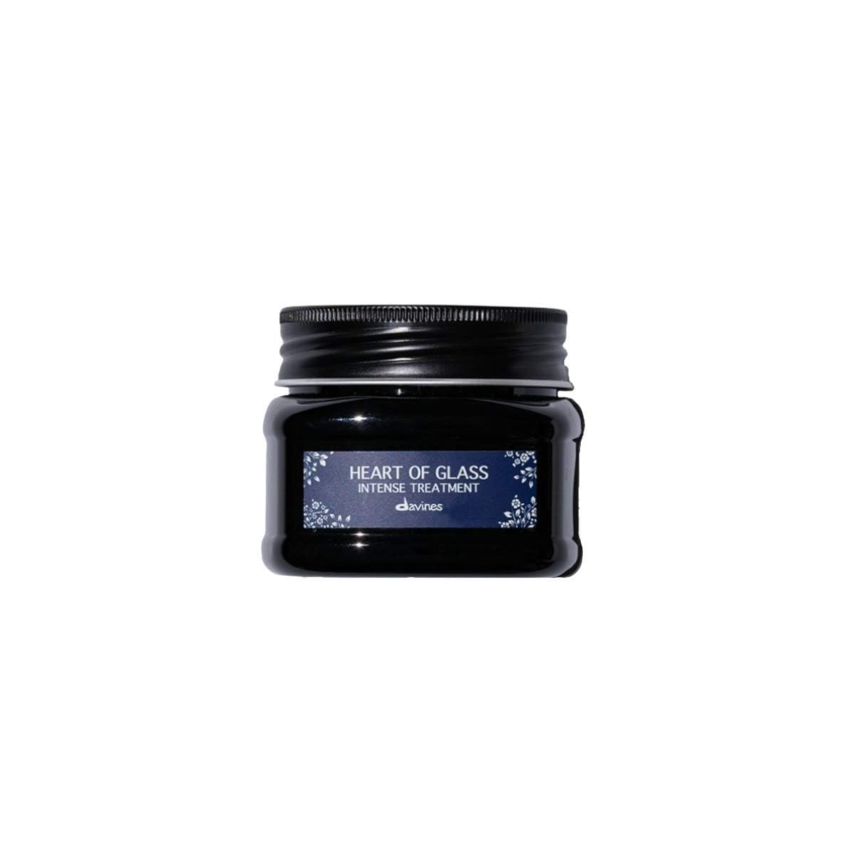 Davines Heart Of Glass bottle closeup for strengthening and brightening blond hair.