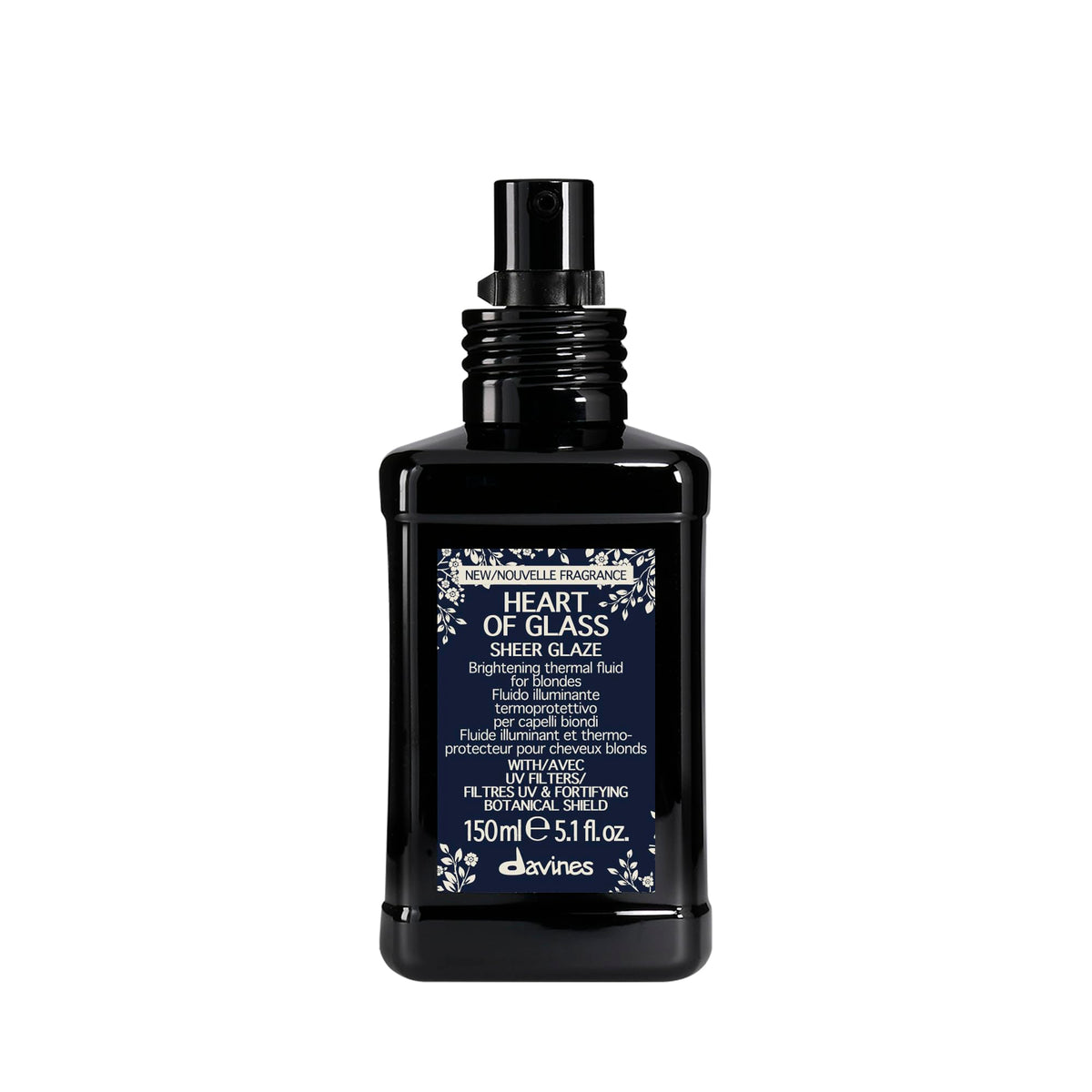 Davines Heart of Glass Sheer Glaze bottle close-up for brightening blondes.