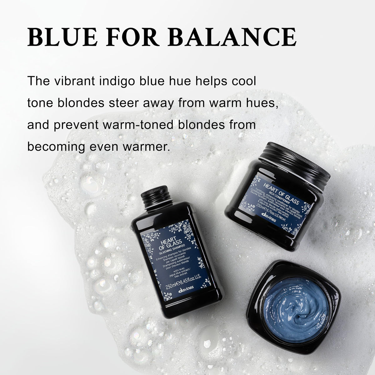 Davines Heart of Glass bottle under soft lighting, blue hue emphasized.