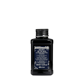 Davines Heart of Glass bottle close-up highlighting blue tones for blondes.