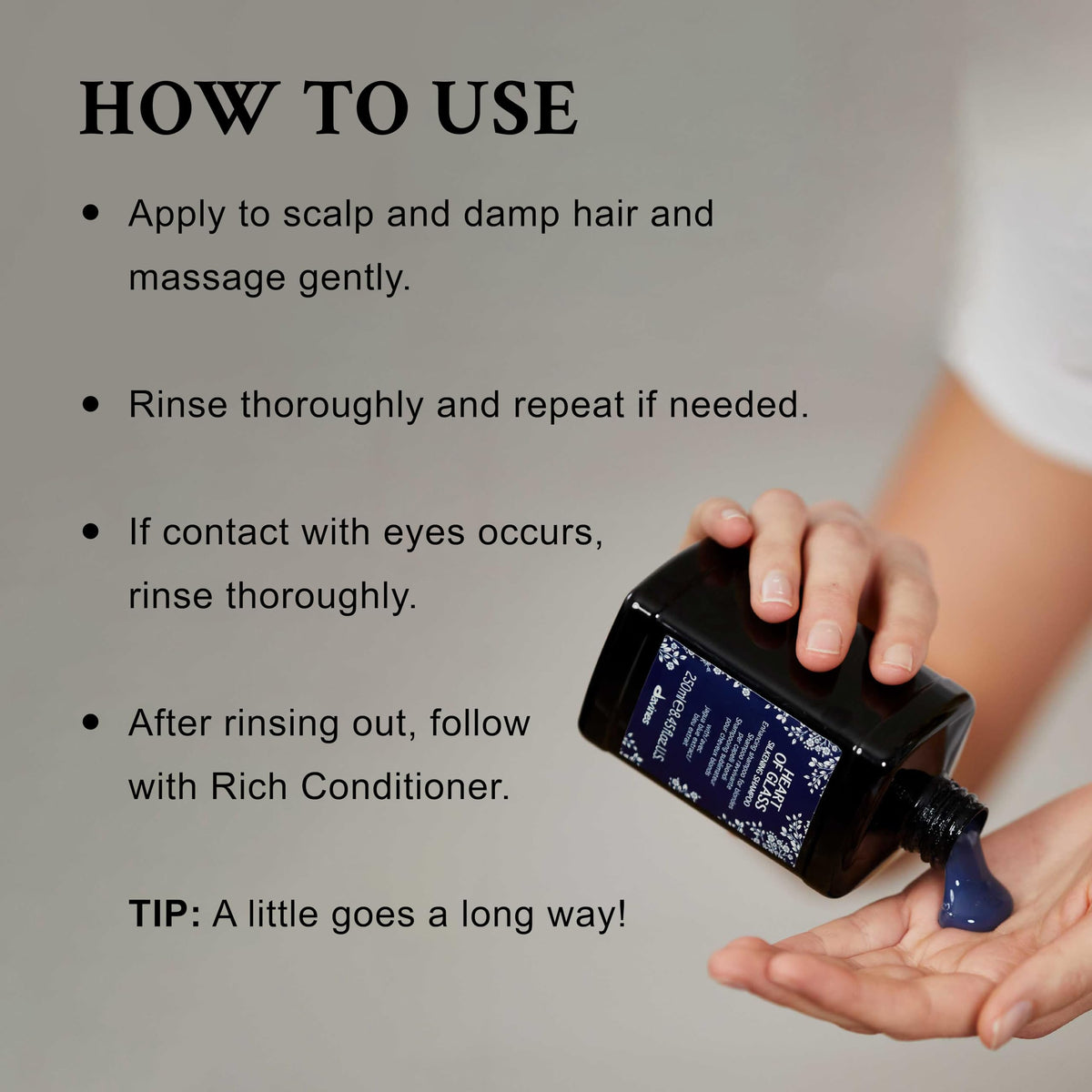 Davines Heart of Glass amber bottle on a bright bathroom shelf.
