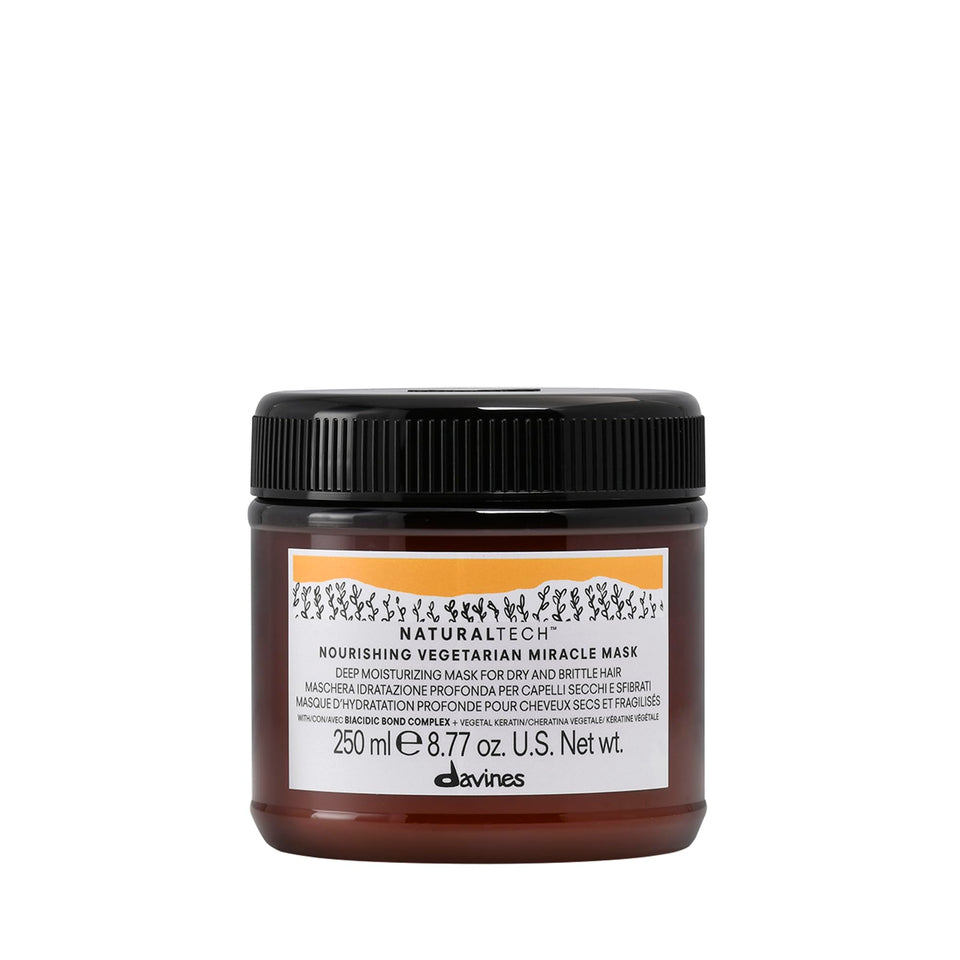 Davines Naturaltech Nourishing Mask bottle front shows hydration and manageability.