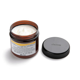 Davines Naturaltech Nourishing Mask texture close-up reveals creamy consistency.