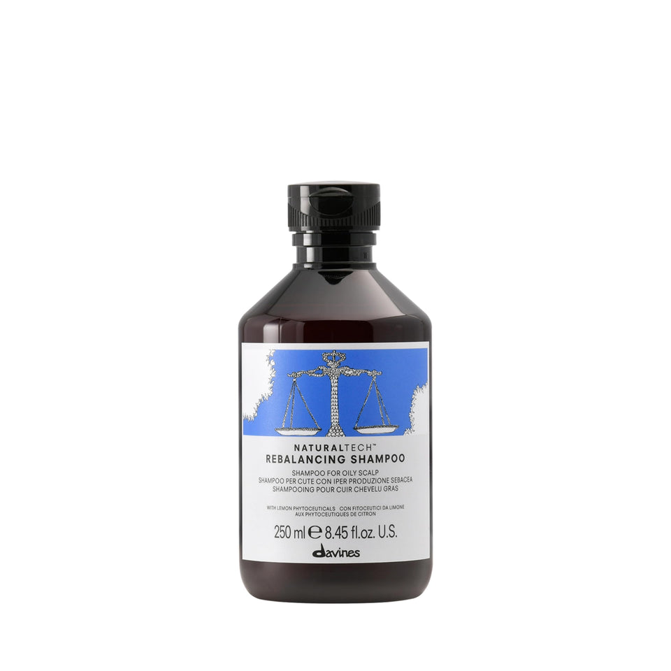 Davines Naturaltech Rebalancing Shampoo bottle on shelf for oil control