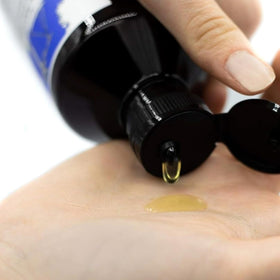Fresh lemon slices with Davines Rebalancing Shampoo highlight citrus phytoceuticals