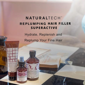 Davines Naturaltech Replumping serum-texture close-up shows creamy consistency for even coating.