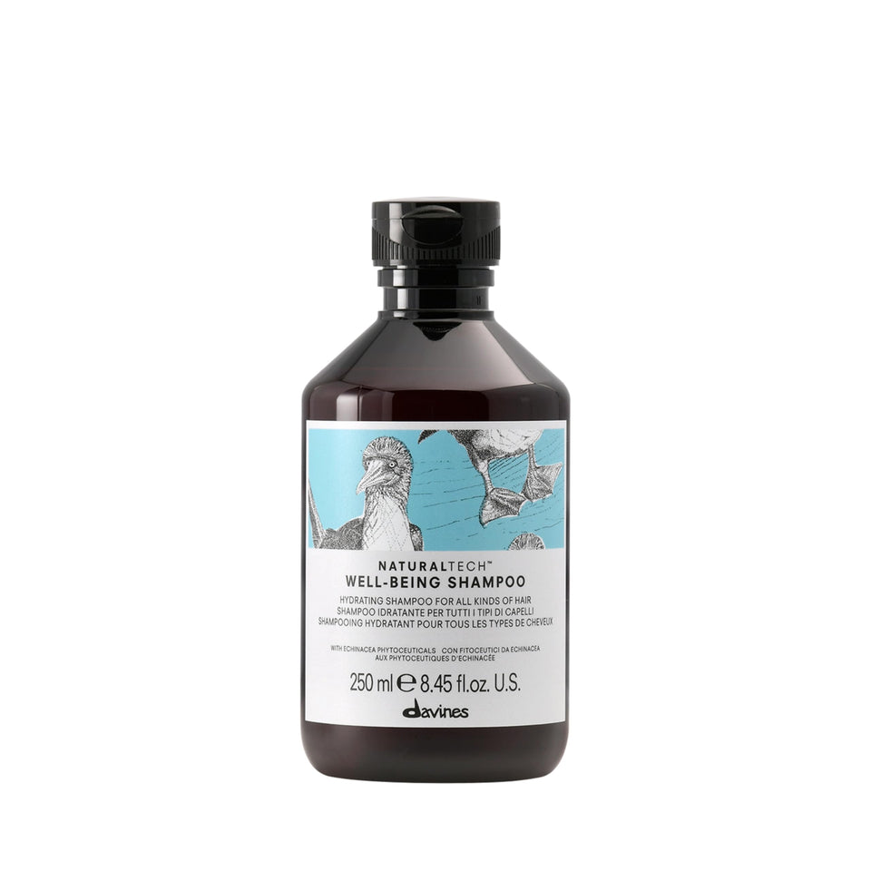 Davines Naturaltech Wellbeing Shampoo bottle pour for daily cleansing and refreshed scalp.