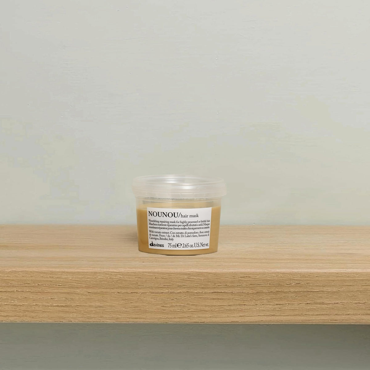 Creamy NOUNOU texture showing rich detangling-friendly consistency.