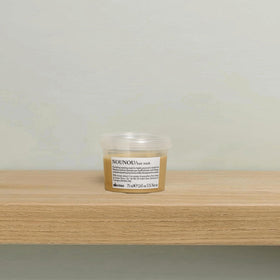 Creamy NOUNOU texture showing rich detangling-friendly consistency.
