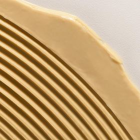 NOUNOU application scene featuring smooth, manageable hair after use.