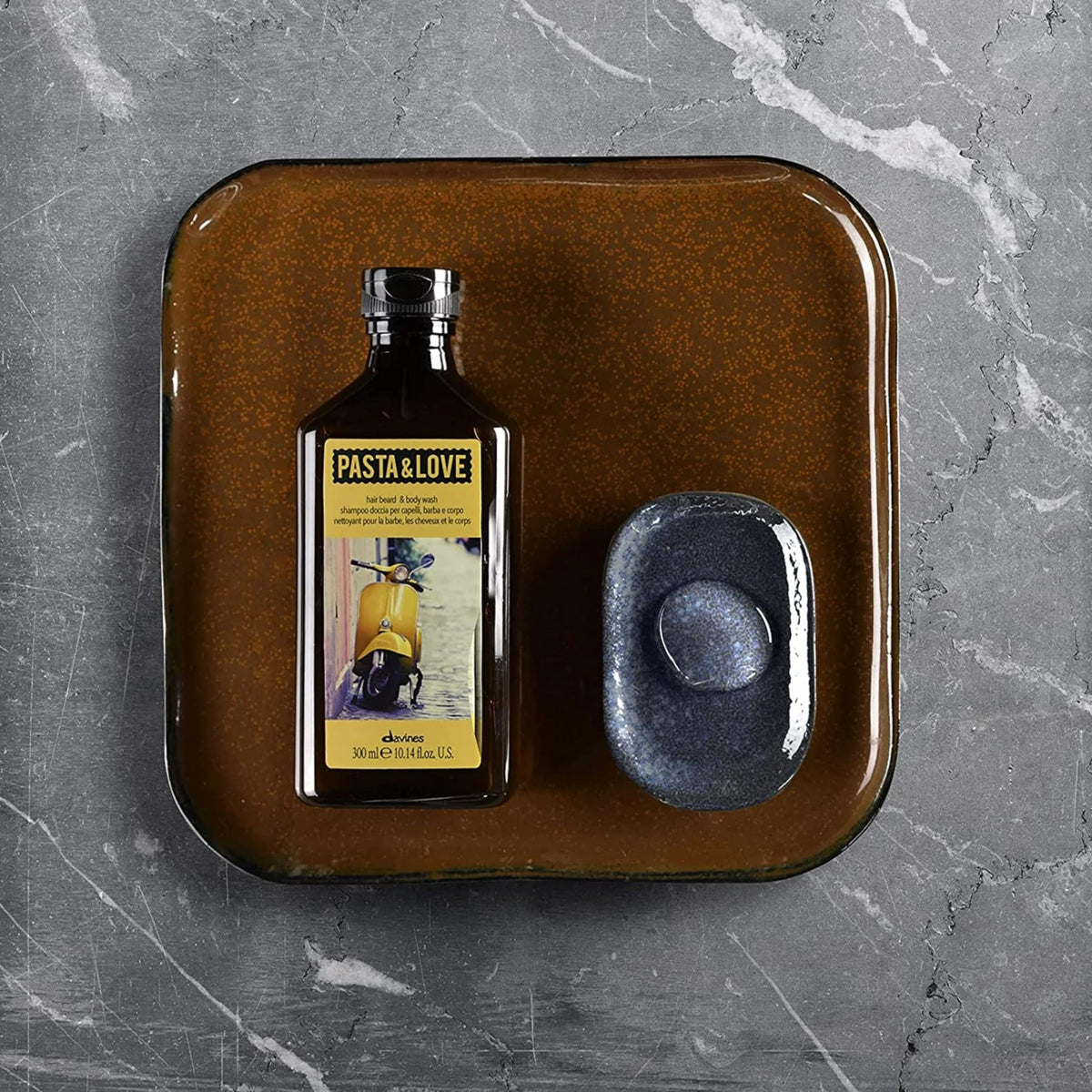 Close-up of citrus fragrance notes on Davines Pasta & Love packaging