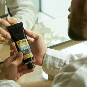 Davines Pasta and Love paste on hands dispersal visual for even coverage.