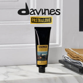 Davines Pasta and Love paste texture finish image highlighting natural shine.