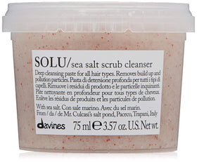 Davines SOLU Sea Salt Scrub bottle pouring cleans scalp