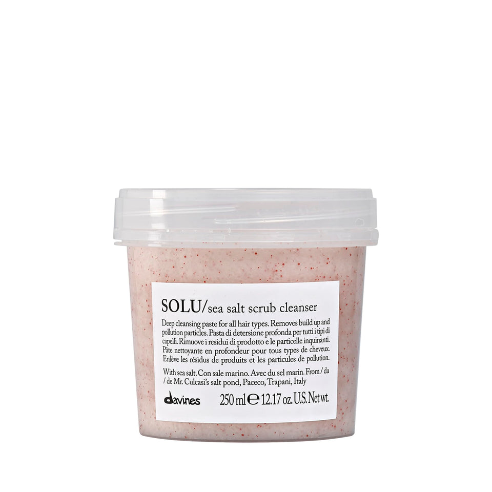 Davines SOLU sea salt scrub bottle for deep scalp cleansing and refreshing results.