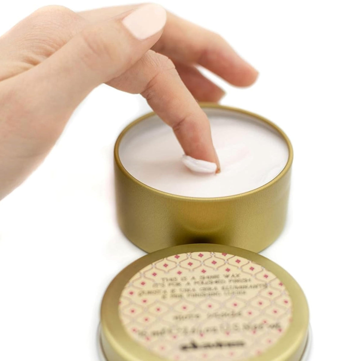 Davines This Is A Shine Wax slick-back styling for a polished look.