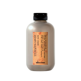 Davines This Is An Oil Non Oil bottle pouring for easy non-greasy styling