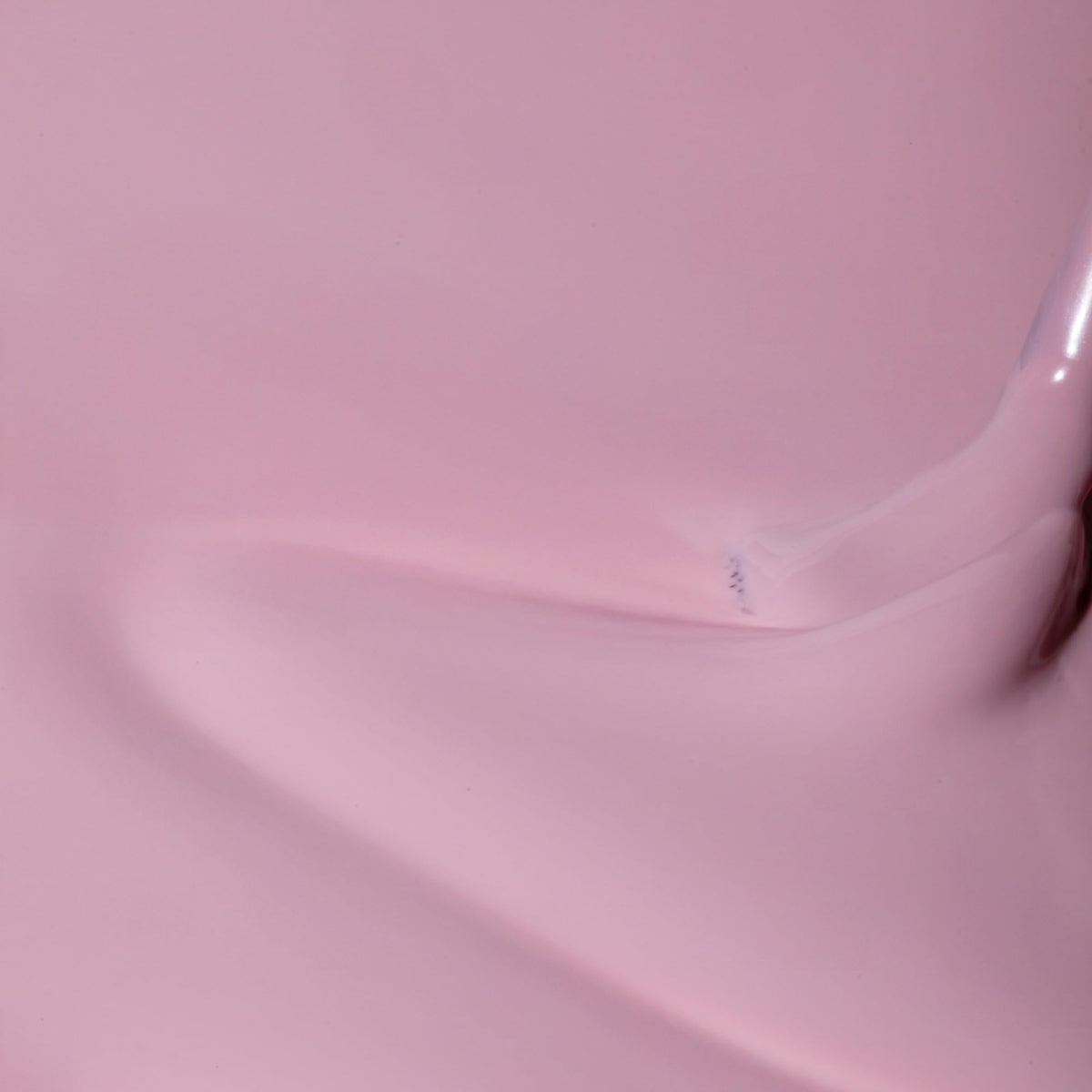 Close up of brush applying Ballet Flats for a smooth finish
