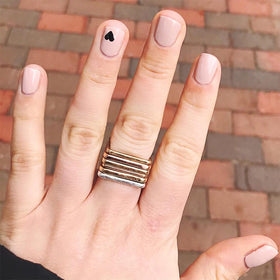 Dazzle Dry Boss nude lacquer swatch on nails for reference.